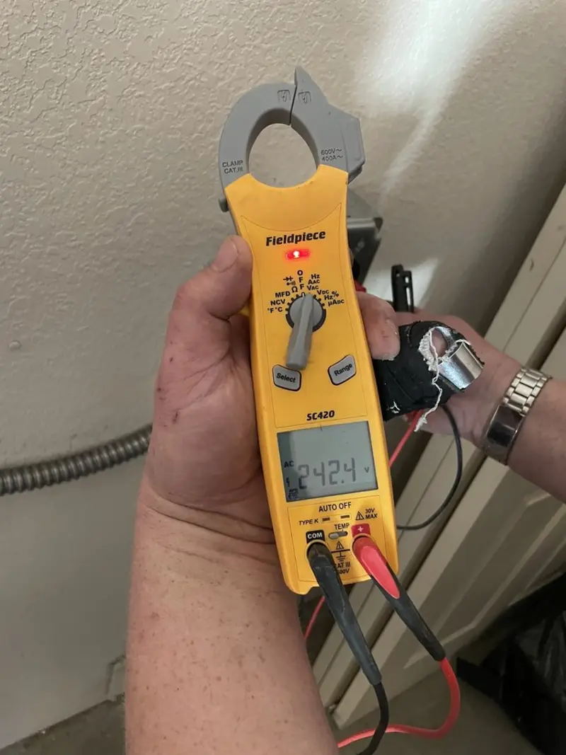 Voltage testing with clamp meter during Circuit Breaker Repair in Lake Murray of Richland